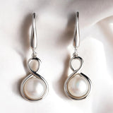 銀繞白珠垂墜耳環