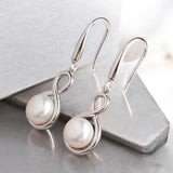 銀繞白珠垂墜耳環