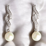 鋯石與白色珍珠垂吊耳環